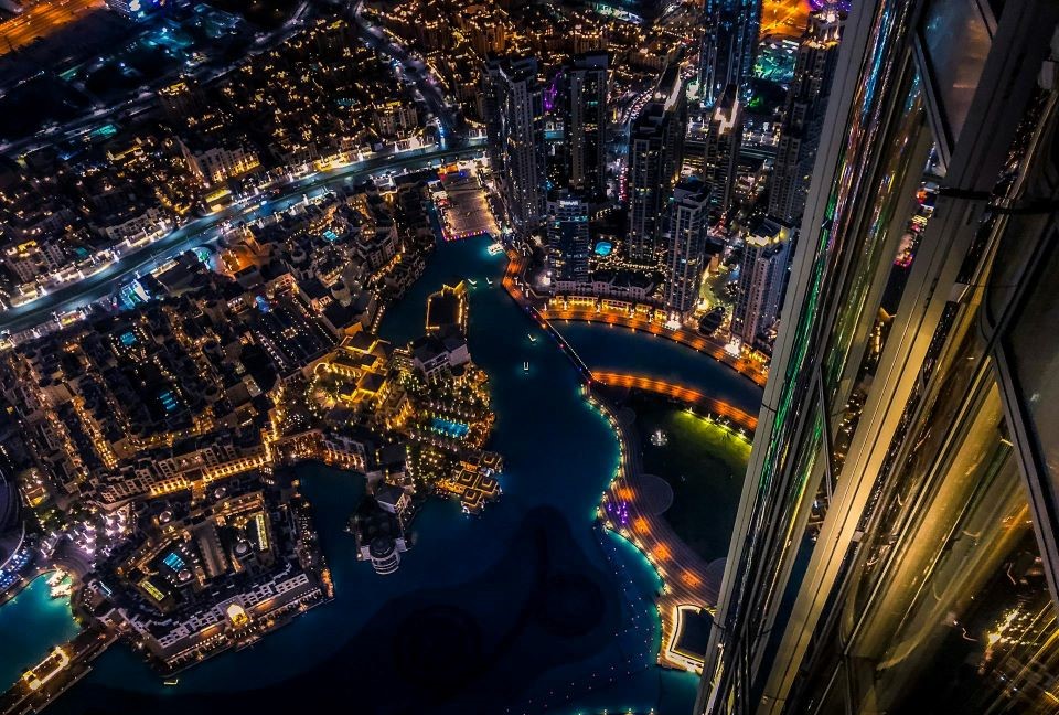an aerial view of nighttime Dubai skyline